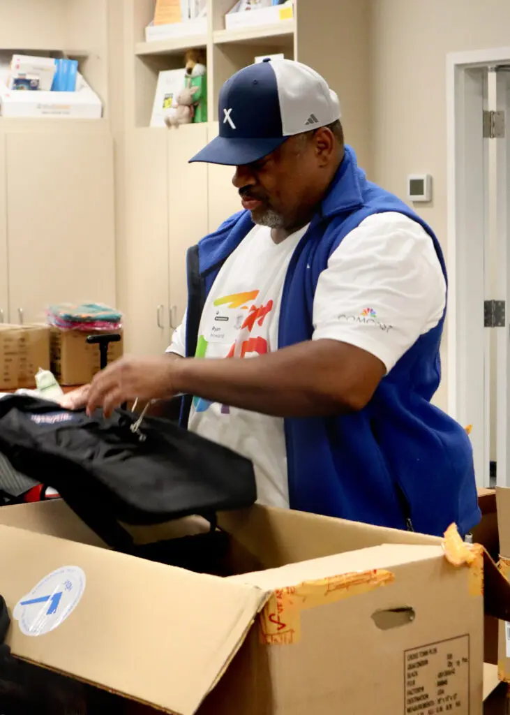 Comcast California employees volunteer at United Way Santa Cruz County's Stuff the Bus