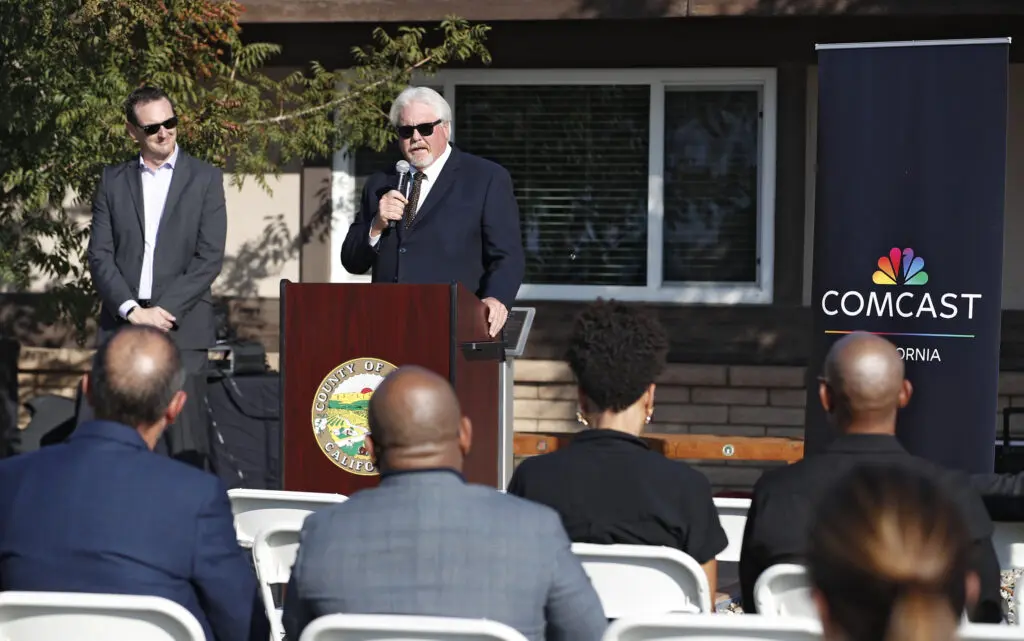 Supervisor Doug Verboon speaks at Comcast's groundbreaking ceremony in Kings County, Calif.