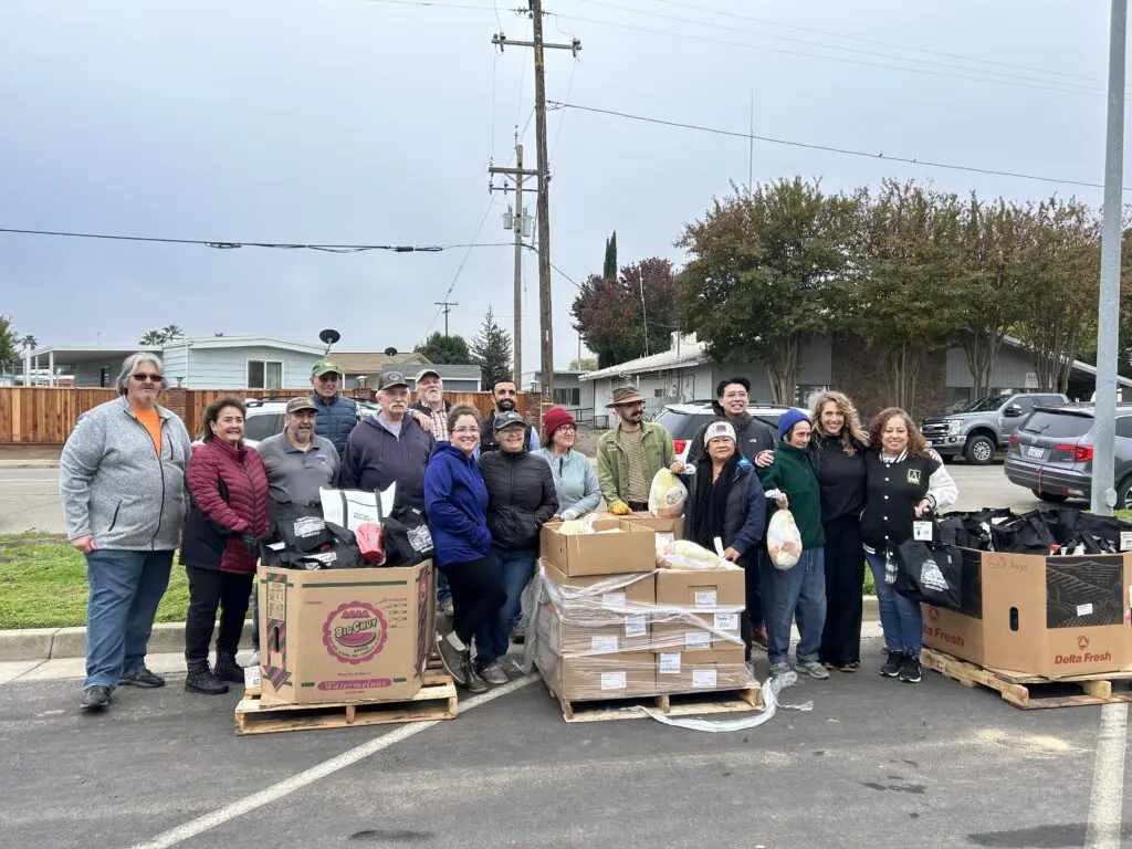 Comcast California partnered with the Merced County Food Bank and Gustine Rotary to bring a holiday food distribution to 400 families in Gustine