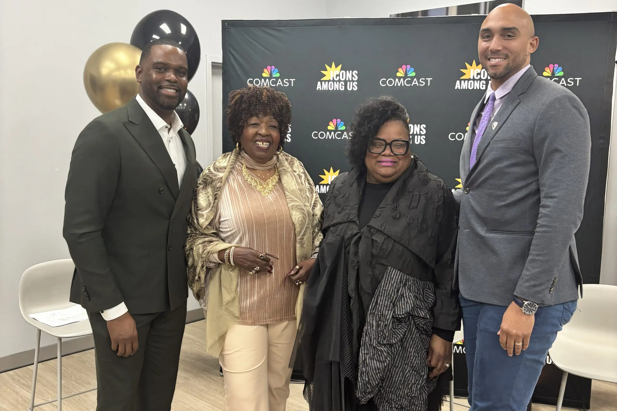 A group of four attendees at the 2026 Icons Among Us community celebration.