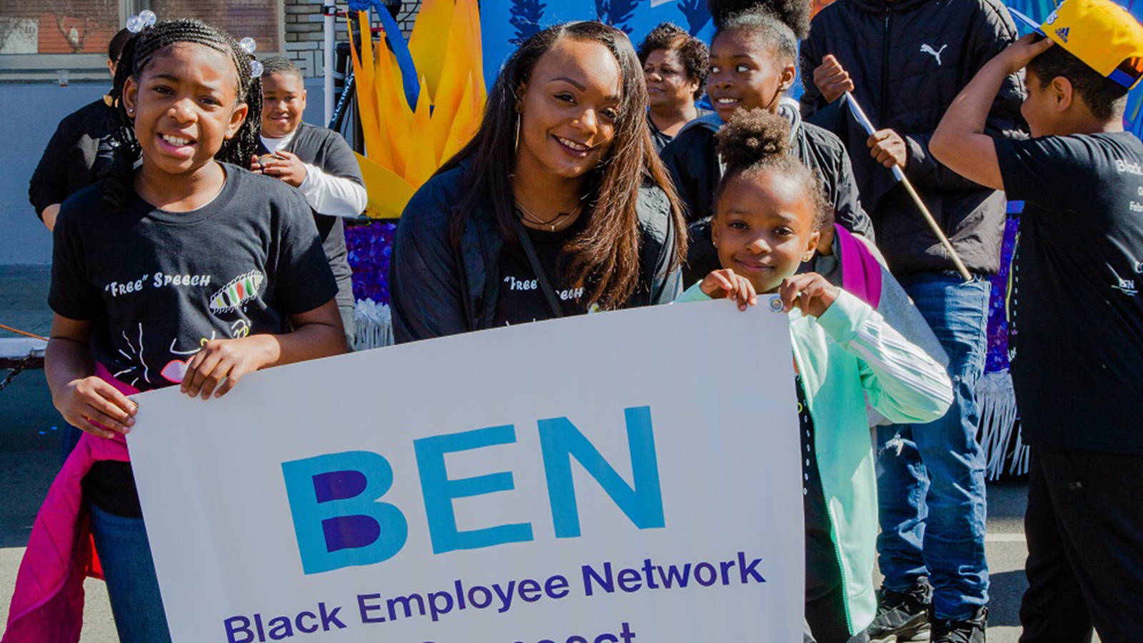 The #BEN Black Employee Network Signage Held By Youth Members