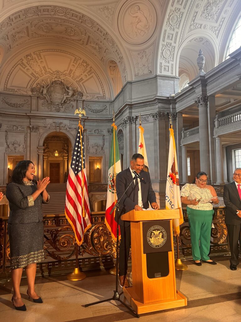 Rob Negrete from Comcast speaking at El Grito VIP Reception at San Francisco City Hall