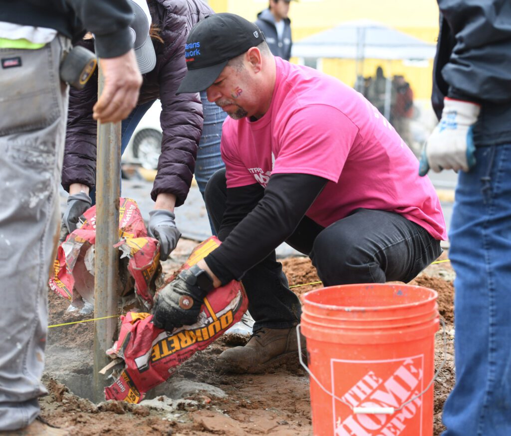 Comcast volunteers for Habitat for Humanity's Women Build help build a home during a Team UP event on Friday, March 1, 2023 in Sacramento, Calif.