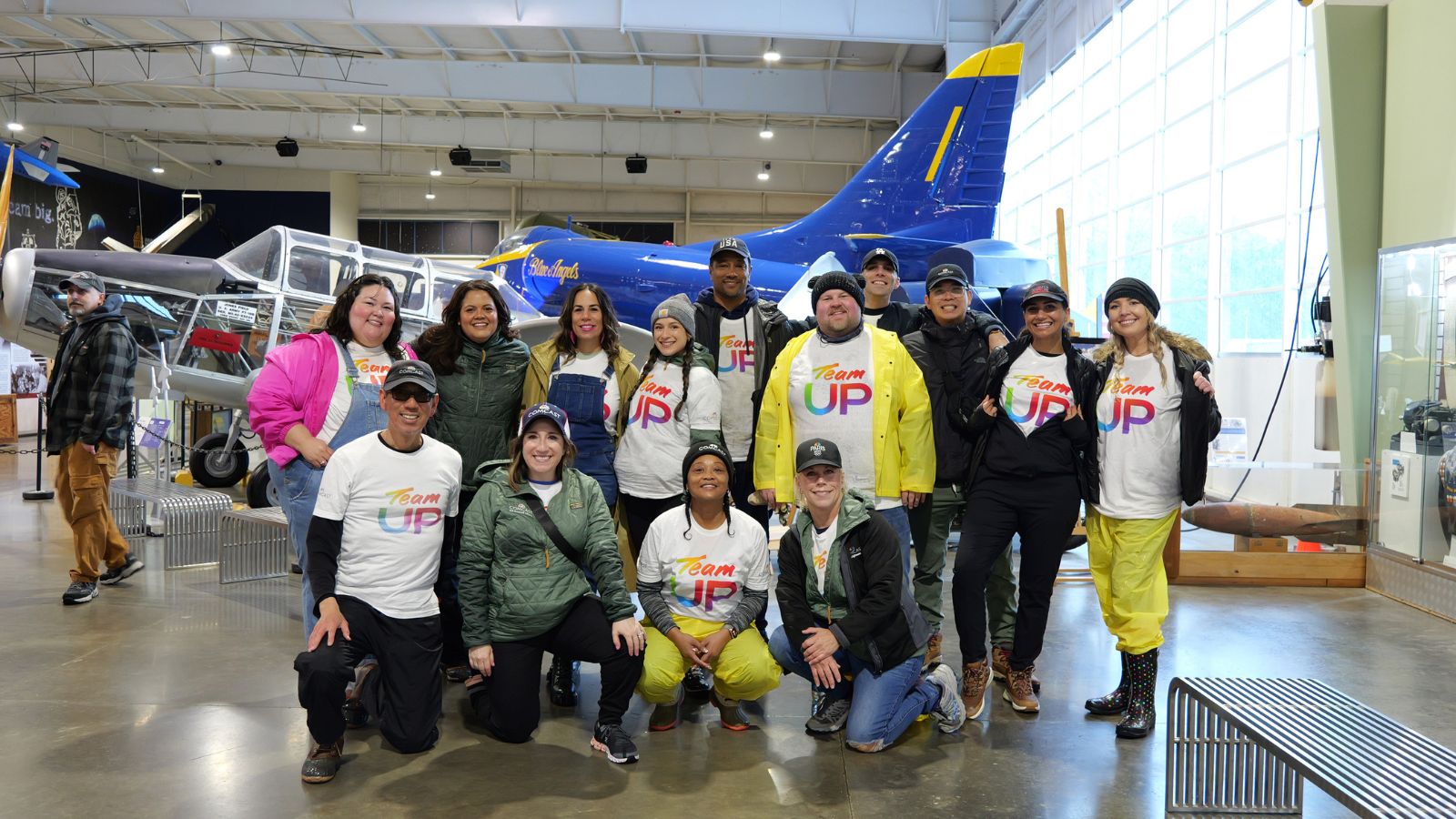 Comcast employees volunteer at the Aerospace Museum of California