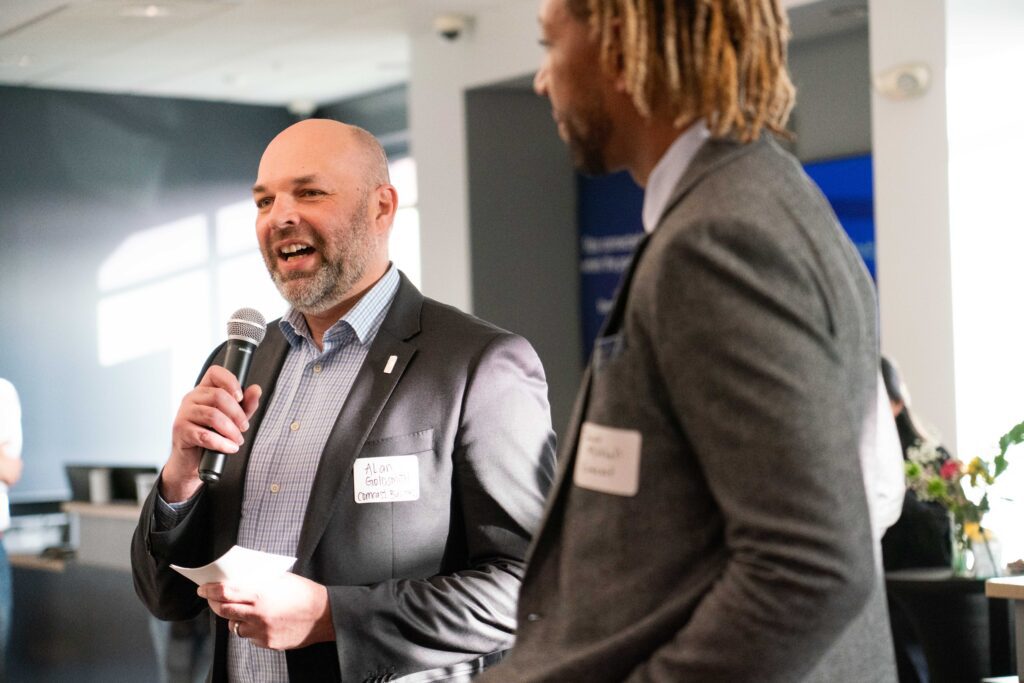 Alan Goldsmith speaks at Palo Alto Chamber Mixer hosted by Comcast at local Xfinity store