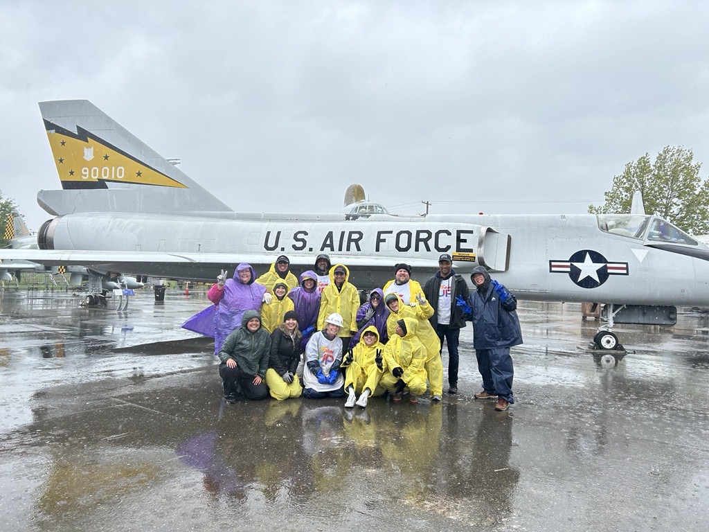 Comcast employees volunteer at the Aerospace Museum of California