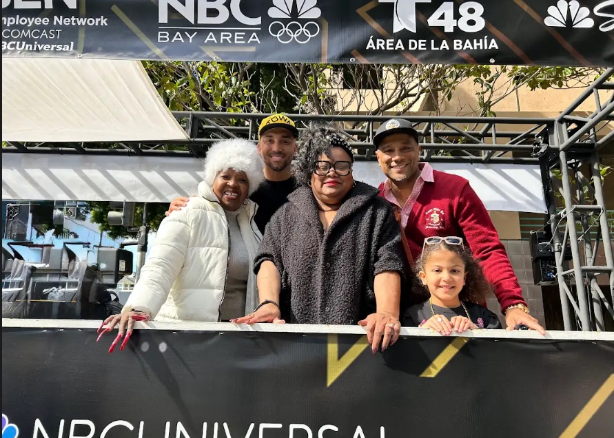 A group of parade attendees in front of a stage at the 2026 Black Joy Parade.
